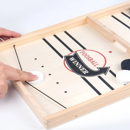 FoosballWinner™ Sling Puck Game