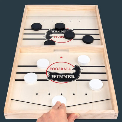 FoosballWinner™ Sling Puck Game